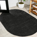 JONATHAN Y Haze Solid Low-Pile Black 6x9 Oval Indoor Area Rug, Coastal,Bohemian,Minimalist,Classic, Easy-Cleaning for Living Room,Bedroom,Kitchen,Pet Friendly,Non-Shedding (SEU100I-6OV) by JONATHANY