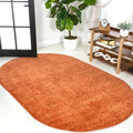 JONATHAN Y Haze Solid Low-Pile Orange 6x9 Oval Indoor Area Rug, Coastal,Bohemian,Minimalist,Classic, Easy-Cleaning for Living Room,Bedroom,Kitchen,Pet Friendly,Non-Shedding (SEU100M-6OV) by JONATHANY