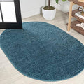 JONATHAN Y Haze Solid Low-Pile Turquoise 5x8 Oval Indoor Area Rug, Coastal,Bohemian,Minimalist,Classic, Easy-Cleaning for Living Room,Bedroom,Kitchen,Pet Friendly,Non-Shedding (SEU100H-5OV) by JONATHANY