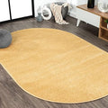 JONATHAN Y Haze Solid Low-Pile Mustard 5x8 Oval Indoor Area Rug, Coastal,Bohemian,Minimalist,Classic, Easy-Cleaning for Living Room,Bedroom,Kitchen,Pet Friendly,Non-Shedding (SEU100B-5OV) by JONATHANY